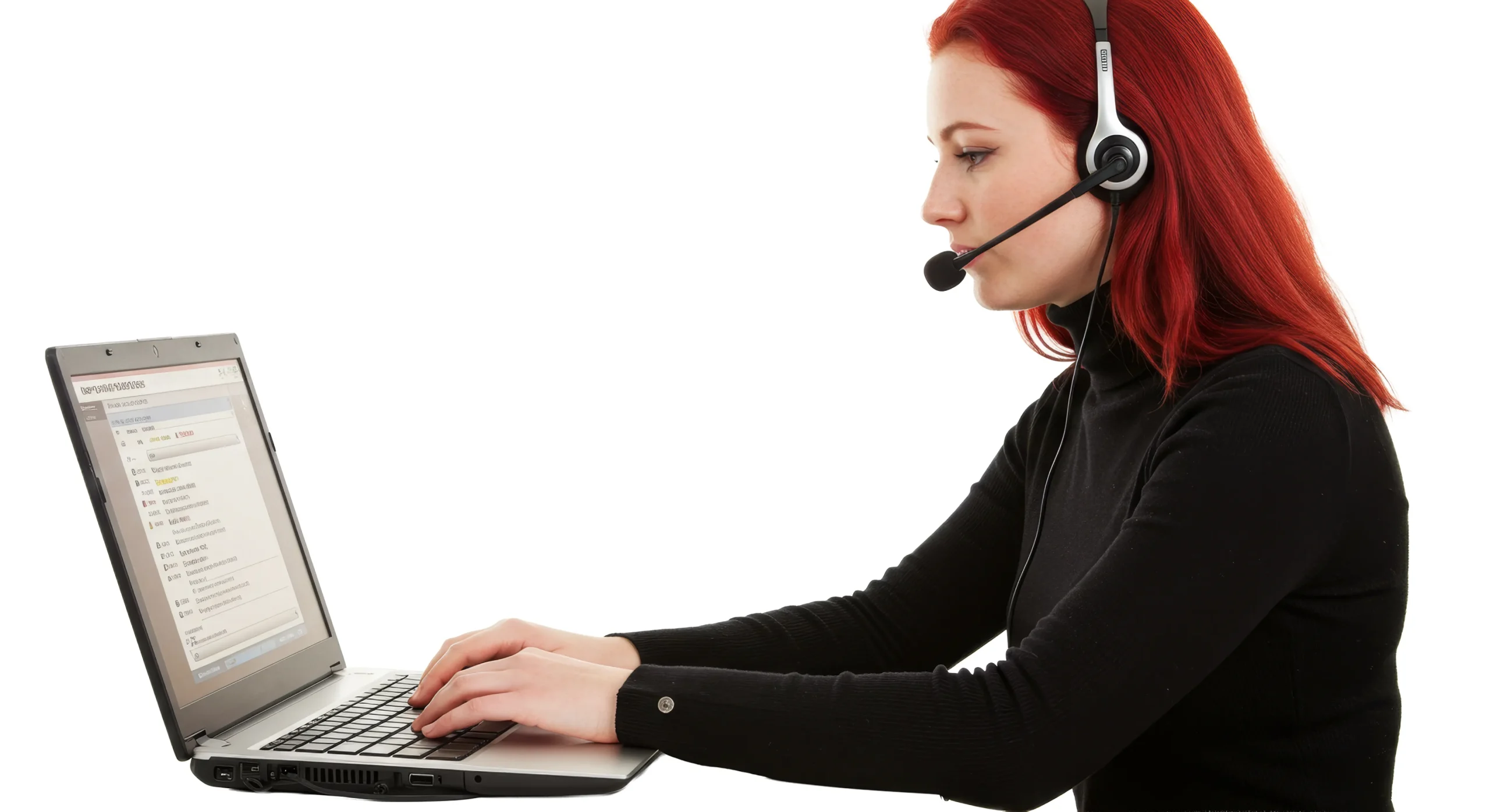 woman with headset typing on laptop with code on screen against white background in studio shot free photo 1